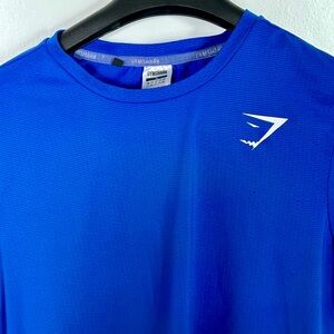 Selling men’s GymShark blue workout shirt size medium